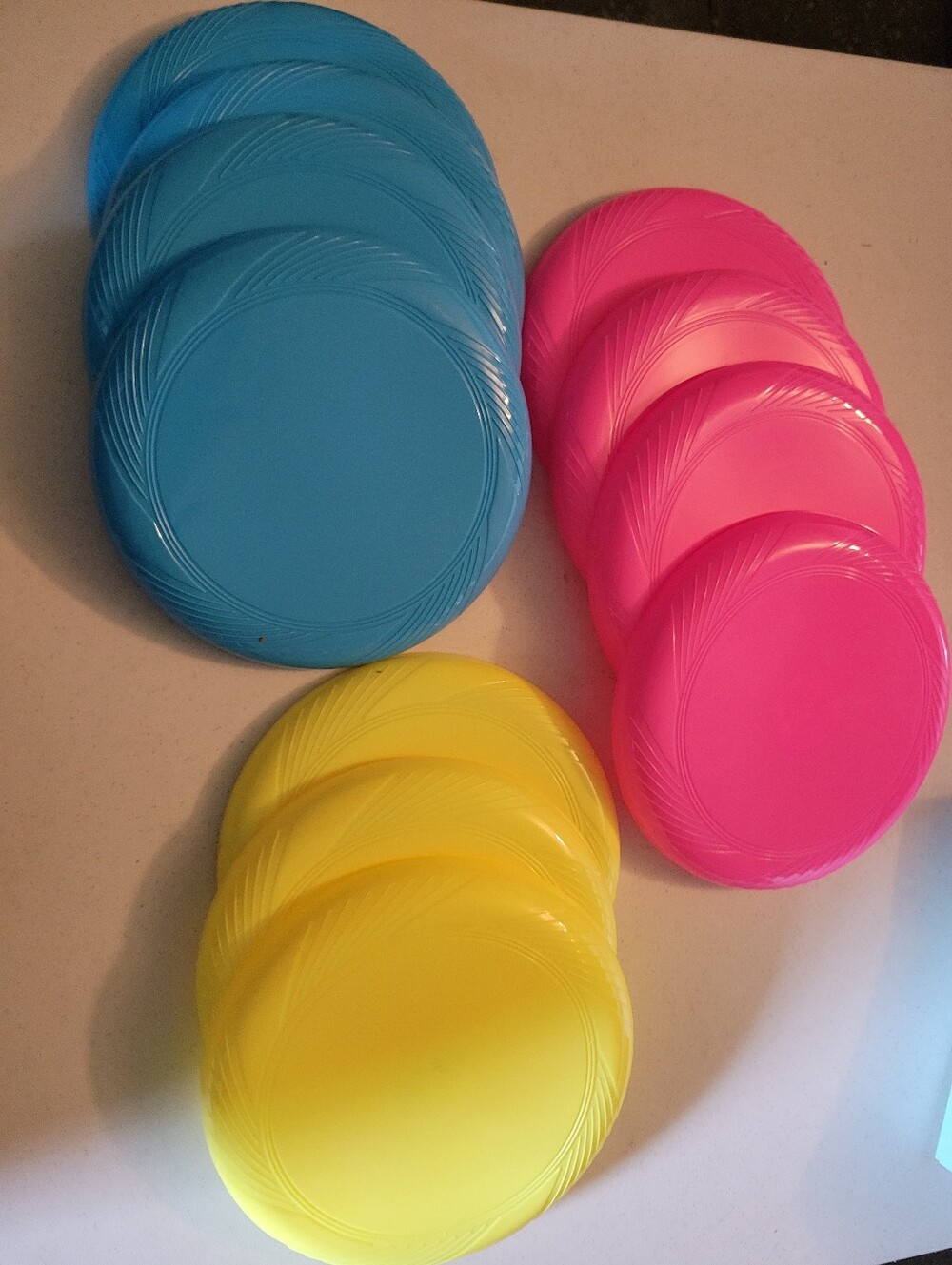 11 Flying Discs. Assorted. All New Unused.
